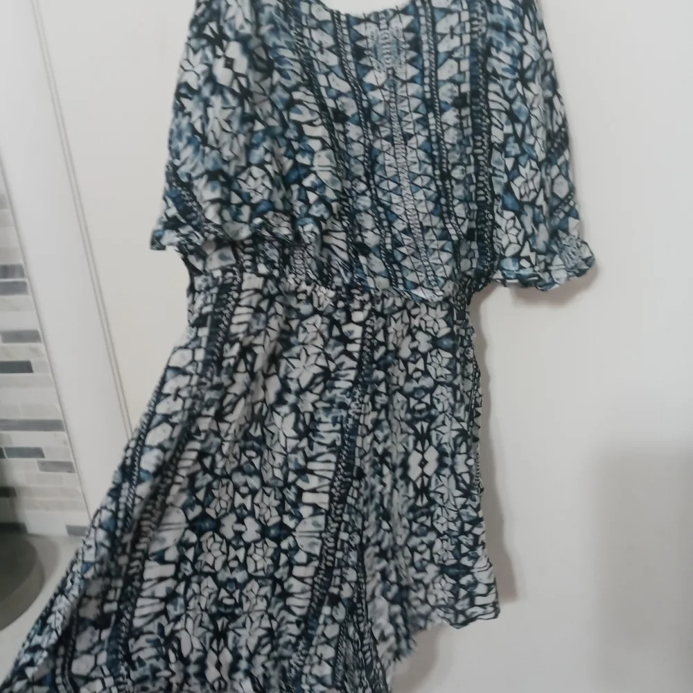 Olivaceous Sleeveless Romper. Adjustable Straps. Layered Ruffle top